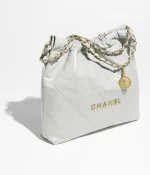 CHANEL / CHANEL 22 HANDBAG Shiny Calfskin & Gold-Tone Metal Light Blue - Image 2