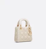 DIOR / MINI LADY DIOR BAG Latte Crinkle-Effect Lambskin with White Resin Half-Pearl Cannage Motif M0505OWFX_M941 - Image 2